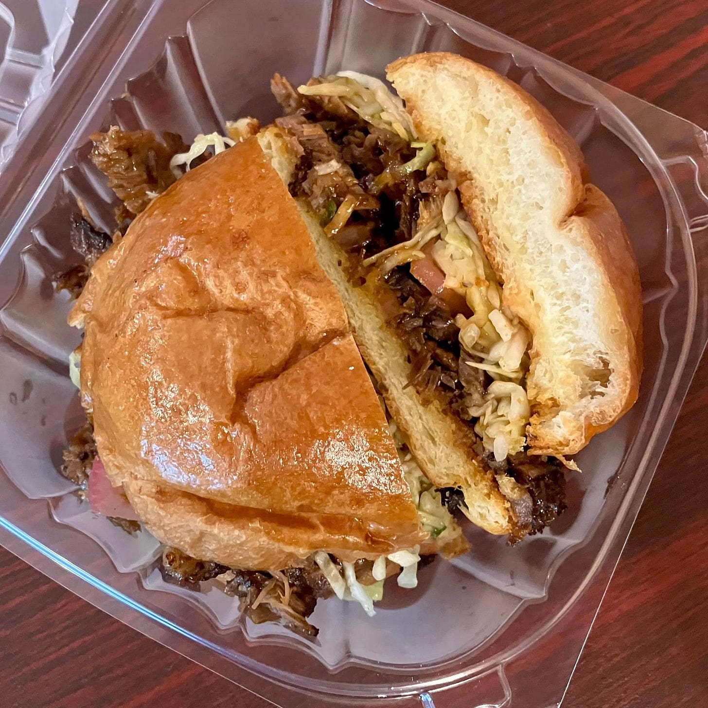 May be an image of chicken sandwich
