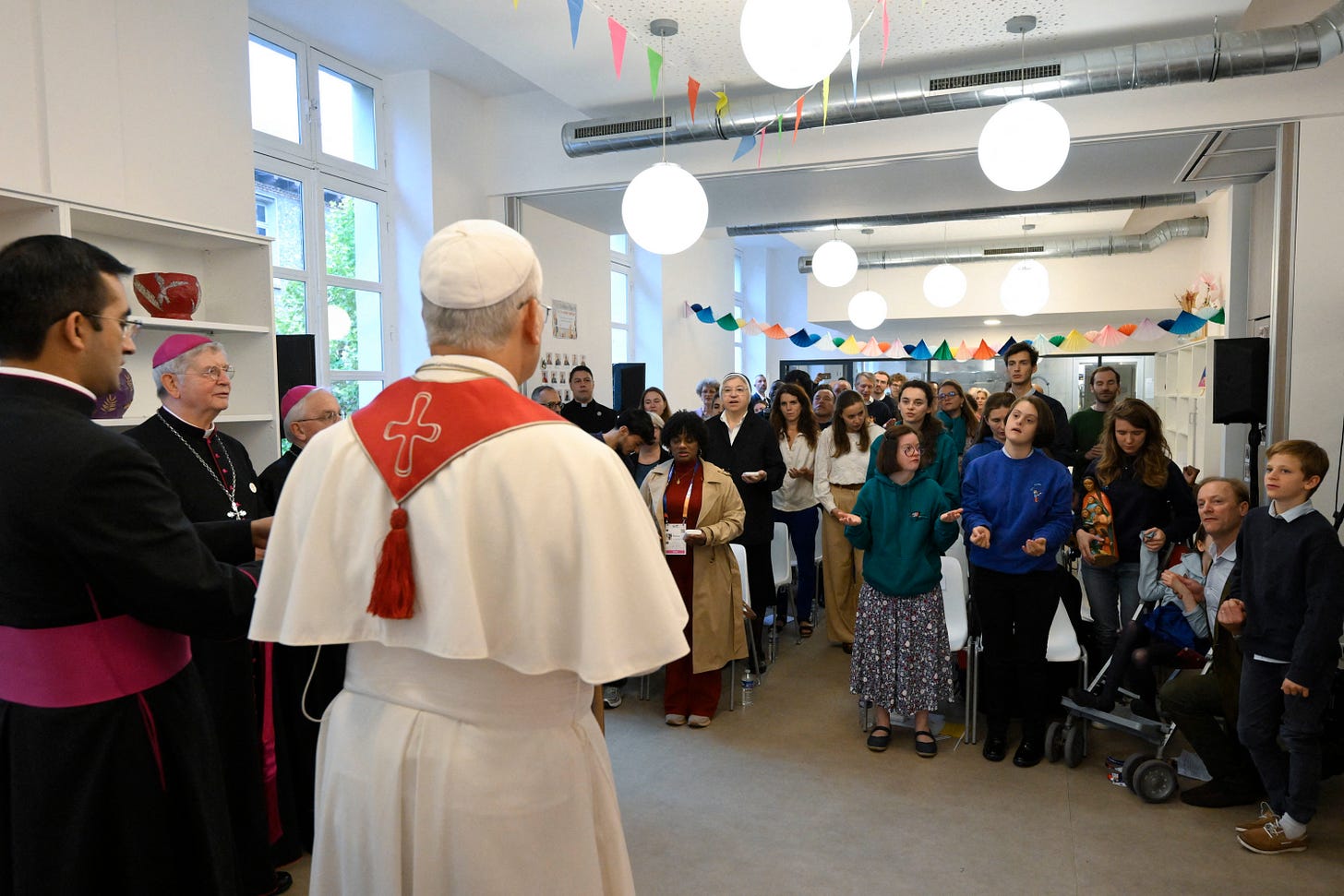 Pope Leo XIV addresses residents and volunteers at Maison Bakhita in Paris Pope Leo XIV addresses residents and volunteers at Maison Bakhita in Paris