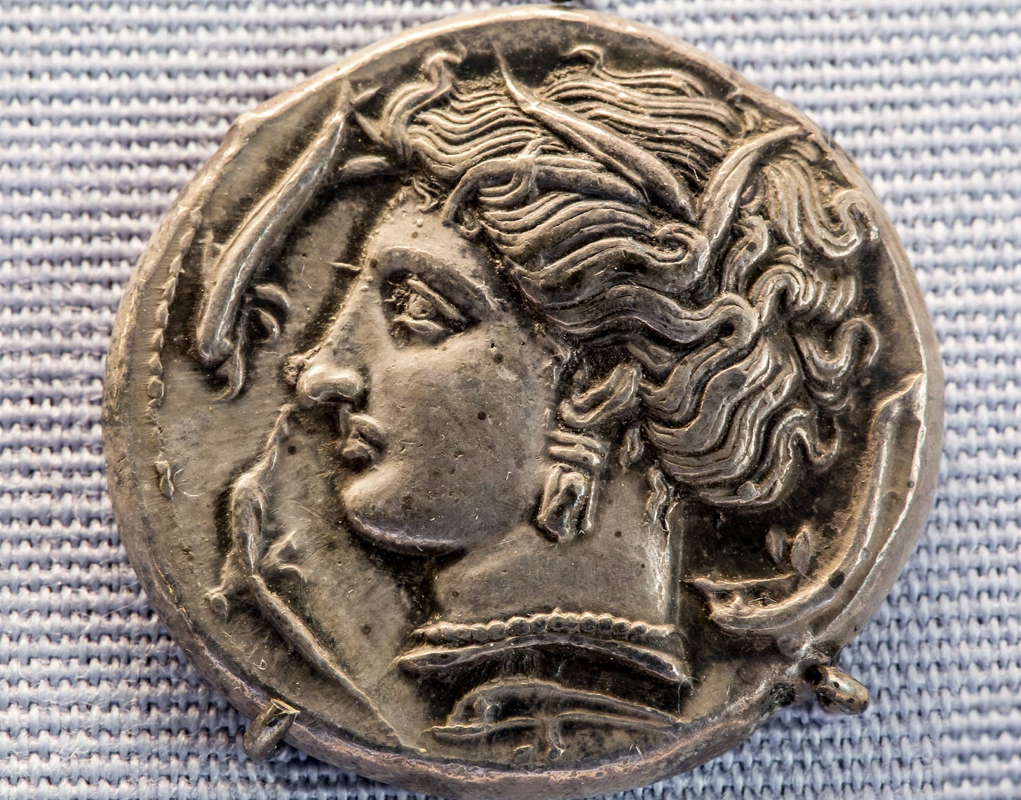An Ancient Carthage Coin with a picture of Tanit on it. An Ancient Carthage Coin with a picture of Tanit on it.