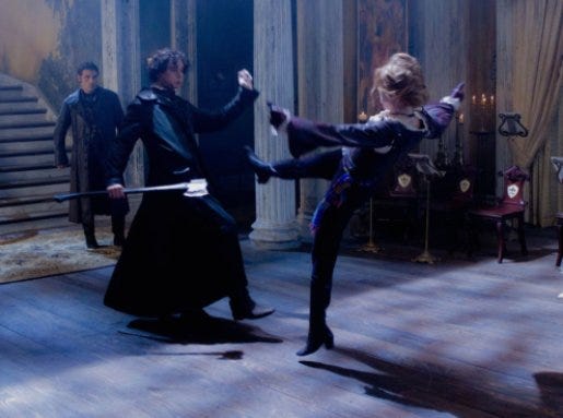DF_24794 - Vampire Hunter Abraham Lincoln (Benjamin Walker) battles Vadoma (Erin Wasson), as Adam (Rufus Sewell) watches.