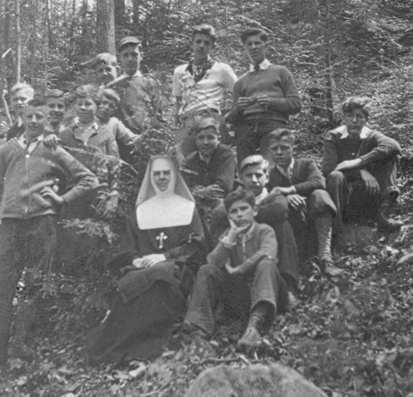 Nun with boys