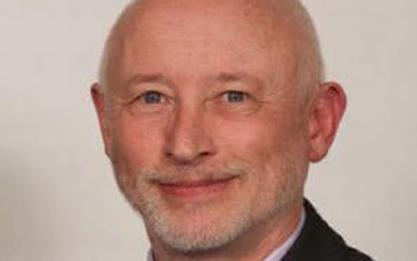 A person smiling for a picture
Description automatically generated A person smiling for a picture
Description automatically generated