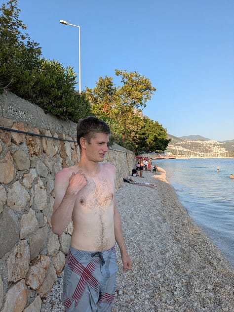 Ancient theater and evening dip in the Mediterranean