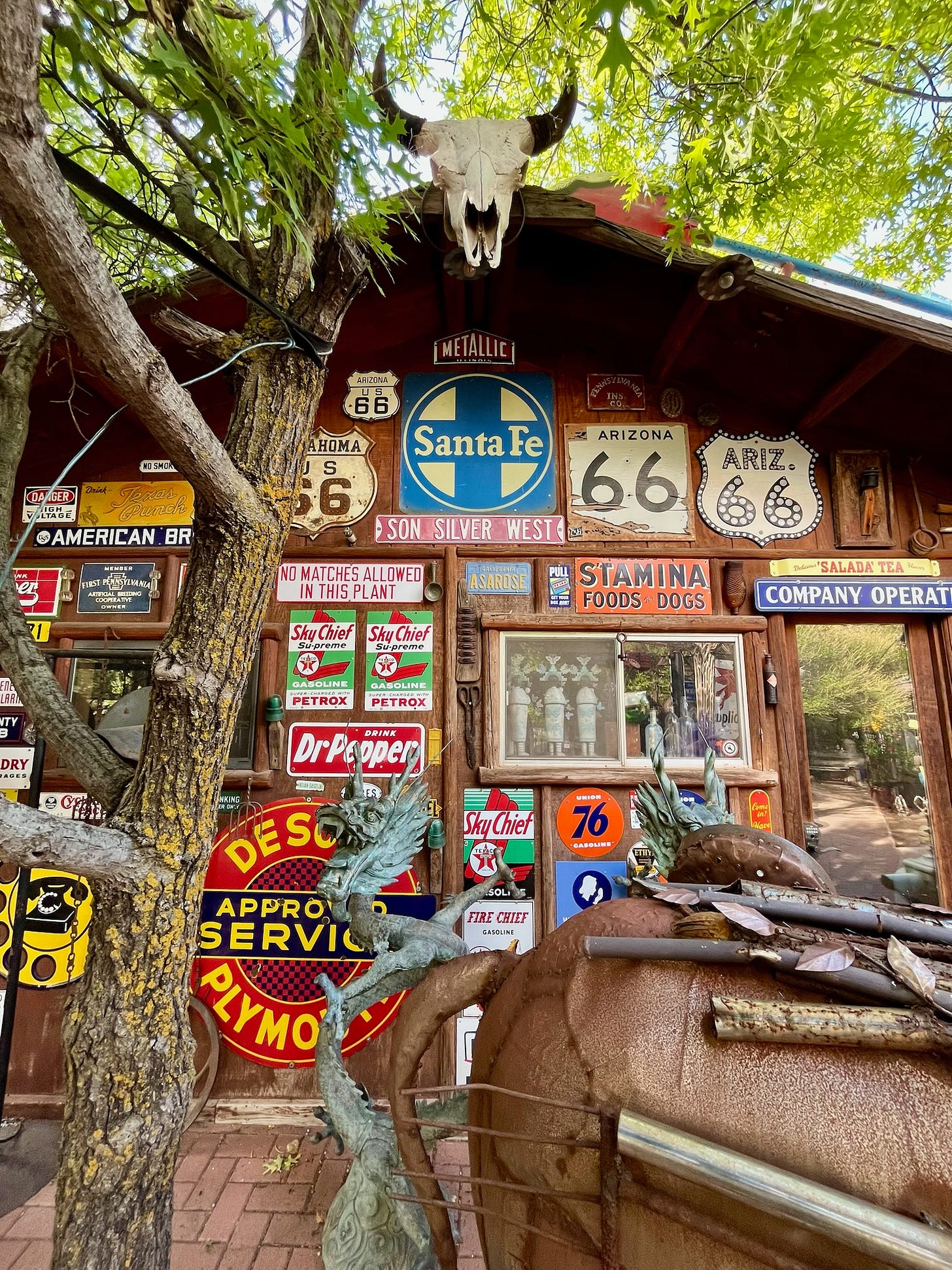 Eclectic folk art, vintage signs, and garden decor at Son Silver West Gallery, a unique roadside attraction in Sedona.