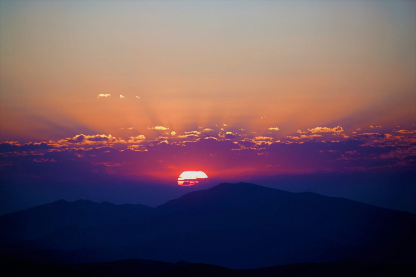 A sunset over mountains with clouds
AI-generated content may be incorrect. A sunset over mountains with clouds
AI-generated content may be incorrect.