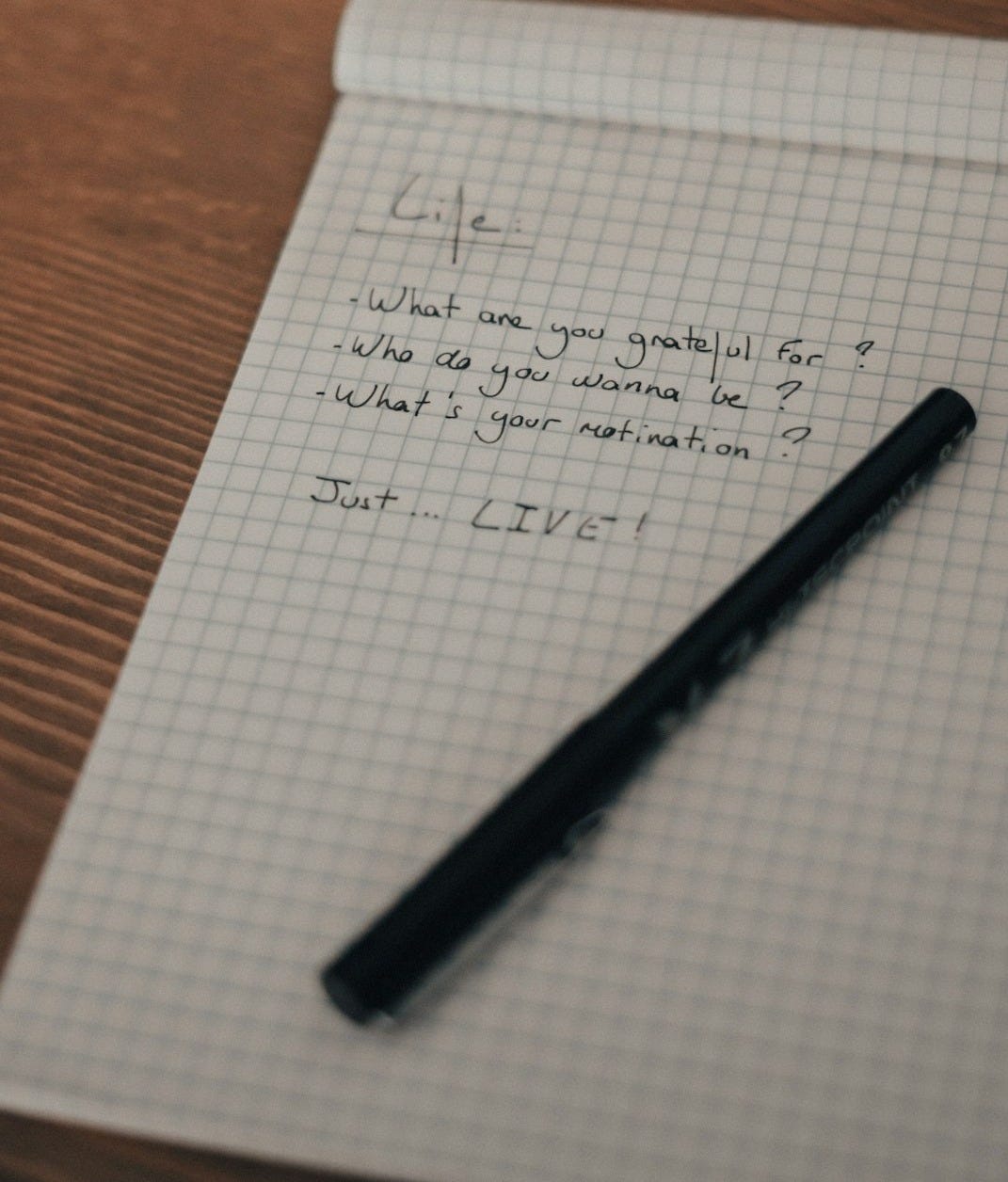 black pen on white graphing paper