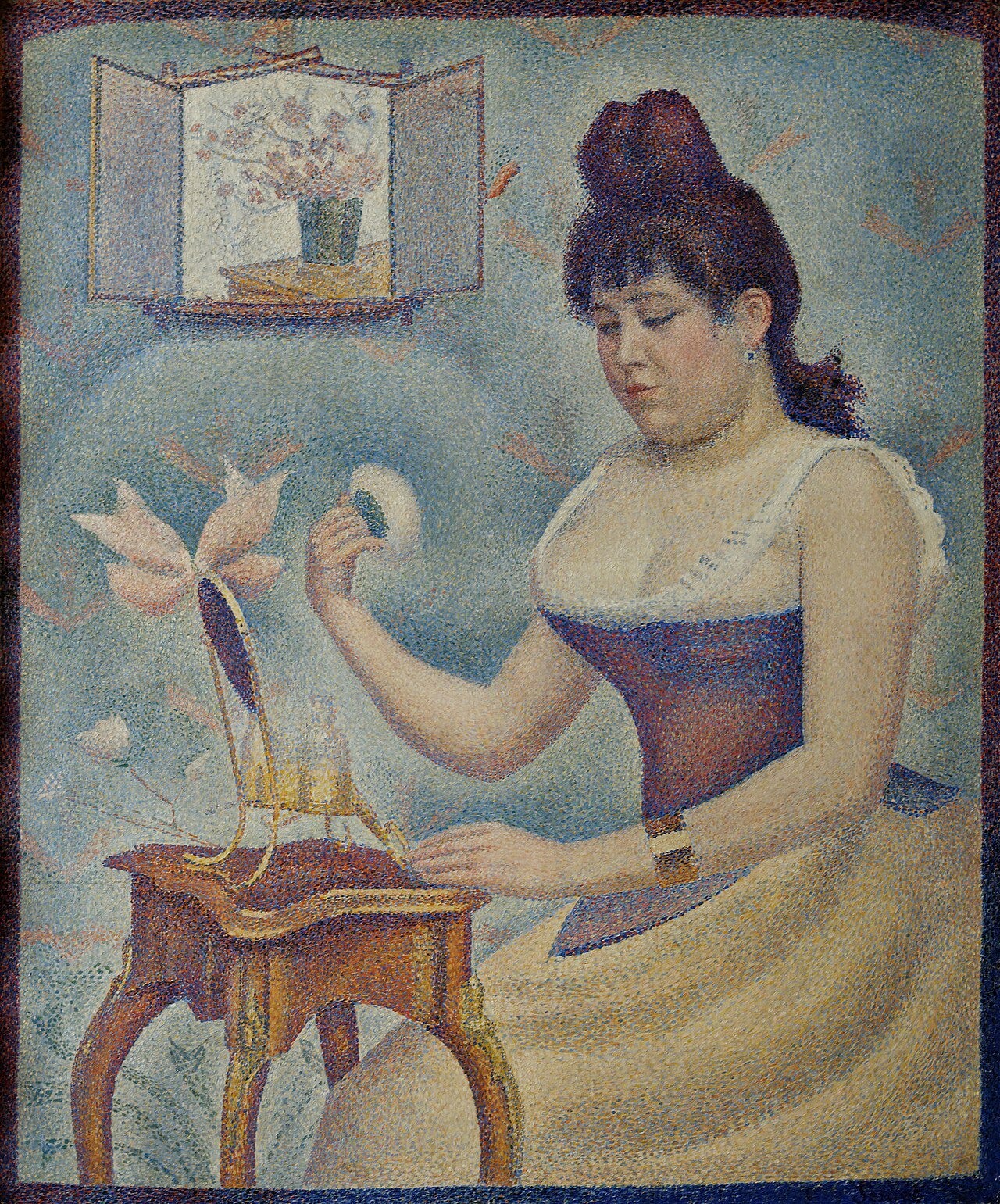 Georges Seurat, Young Woman Powdering Herself, a pointillist portrait built from small dots of color Georges Seurat, Young Woman Powdering Herself, a pointillist portrait built from small dots of color