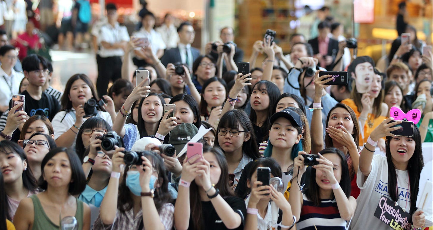 Who are the BTS Army? These K-pop fans will do almost anything to catch a  glimpse of their idols | South China Morning Post