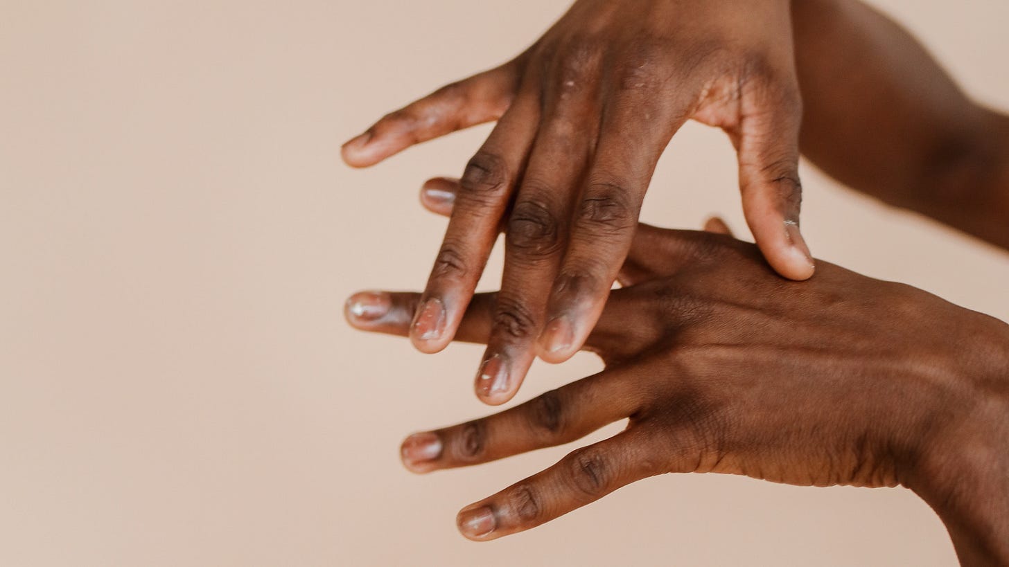 Hands of a Black person Hands of a Black person