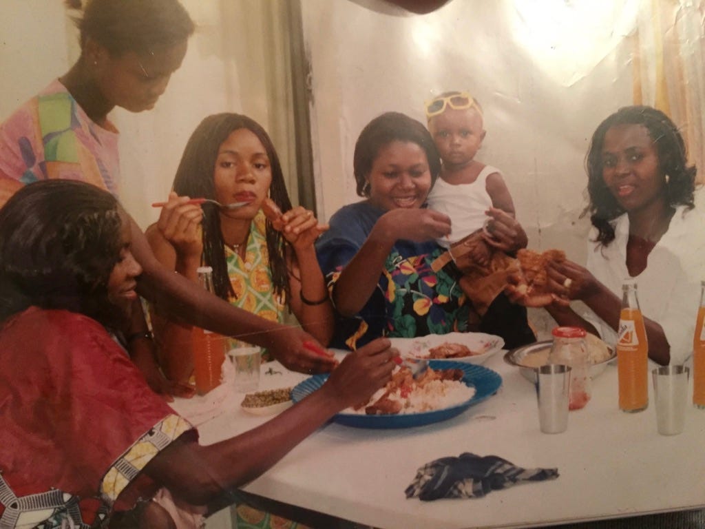 A group of people eating at a table

Description automatically generated