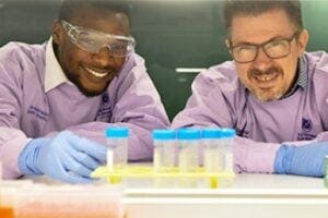 Dr Isaac Akefe and Professor Frederic Meunier in a QBI laboratory.