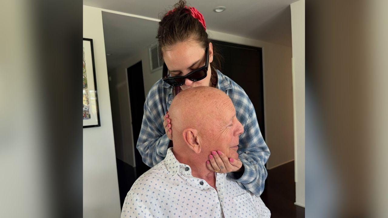 Image of Tallulah Willis leaned over to kiss her famous dad on the head during what she called a 'Sunday funday at Papa's.' Image of Tallulah Willis leaned over to kiss her famous dad on the head during what she called a 'Sunday funday at Papa's.'