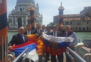 Valdegamberi holds the Russian flag Valdegamberi holds the Russian flag