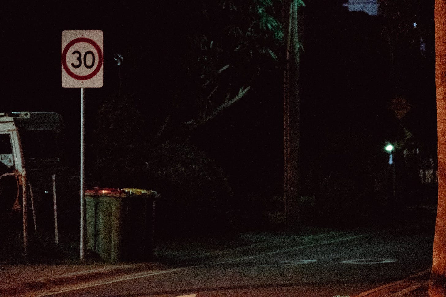 Night Street with Speed Limit Sign
