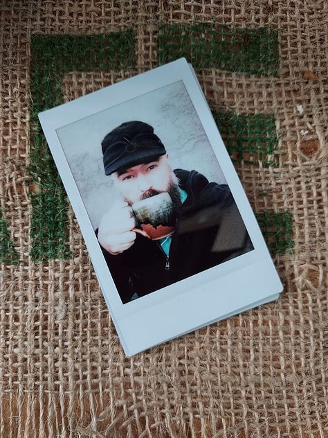 Instant photographs of coffee mugs.