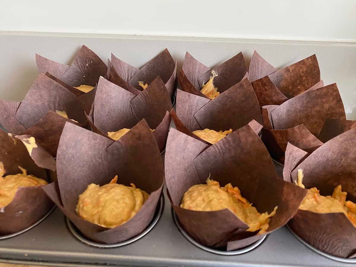 Tray of Carrot cake muffins ready to bake. Tray of Carrot cake muffins ready to bake.
