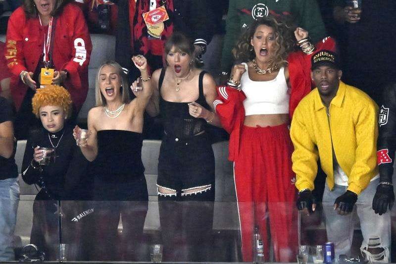 Taylor Swift chugs beer, cuddles Blake Lively and gets mobbed as Chiefs  beat 49ers in the Super Bowl