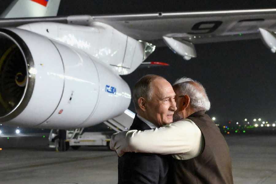 Russian President Vladimir Putin, left, and Indian Prime Minister Narendra Modi embrace each other at the Palam Air Base in New Delhi, India, on Thursday, Dec. 4, 2025. Russian President Vladimir Putin, left, and Indian Prime Minister Narendra Modi embrace each other at the Palam Air Base in New Delhi, India, on Thursday, Dec. 4, 2025.