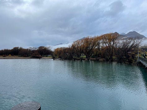 The Famous Glenorchy Boat Shed on the lake, and the mountain range across from it.