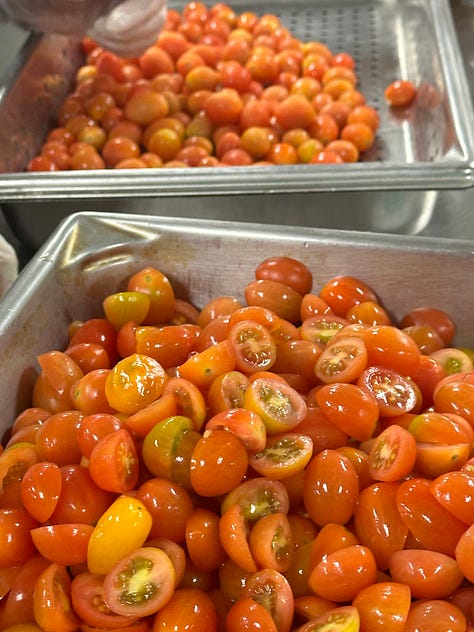 prepping food at the Loews International Hotel