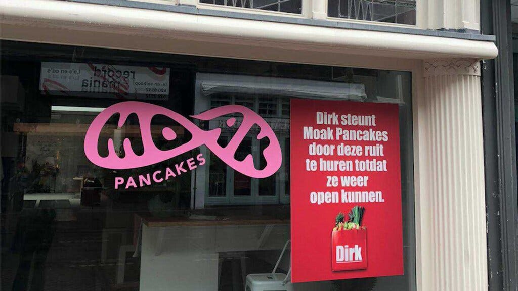 Moat Pancakes and Dirk van den Broek billboard on closed store Moat Pancakes and Dirk van den Broek billboard on closed store