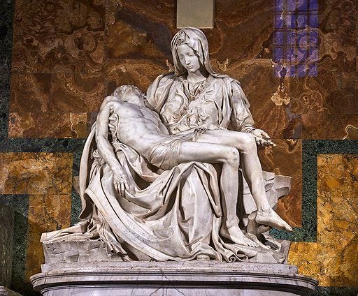 The statue features Mary holding Jesus's dead body
