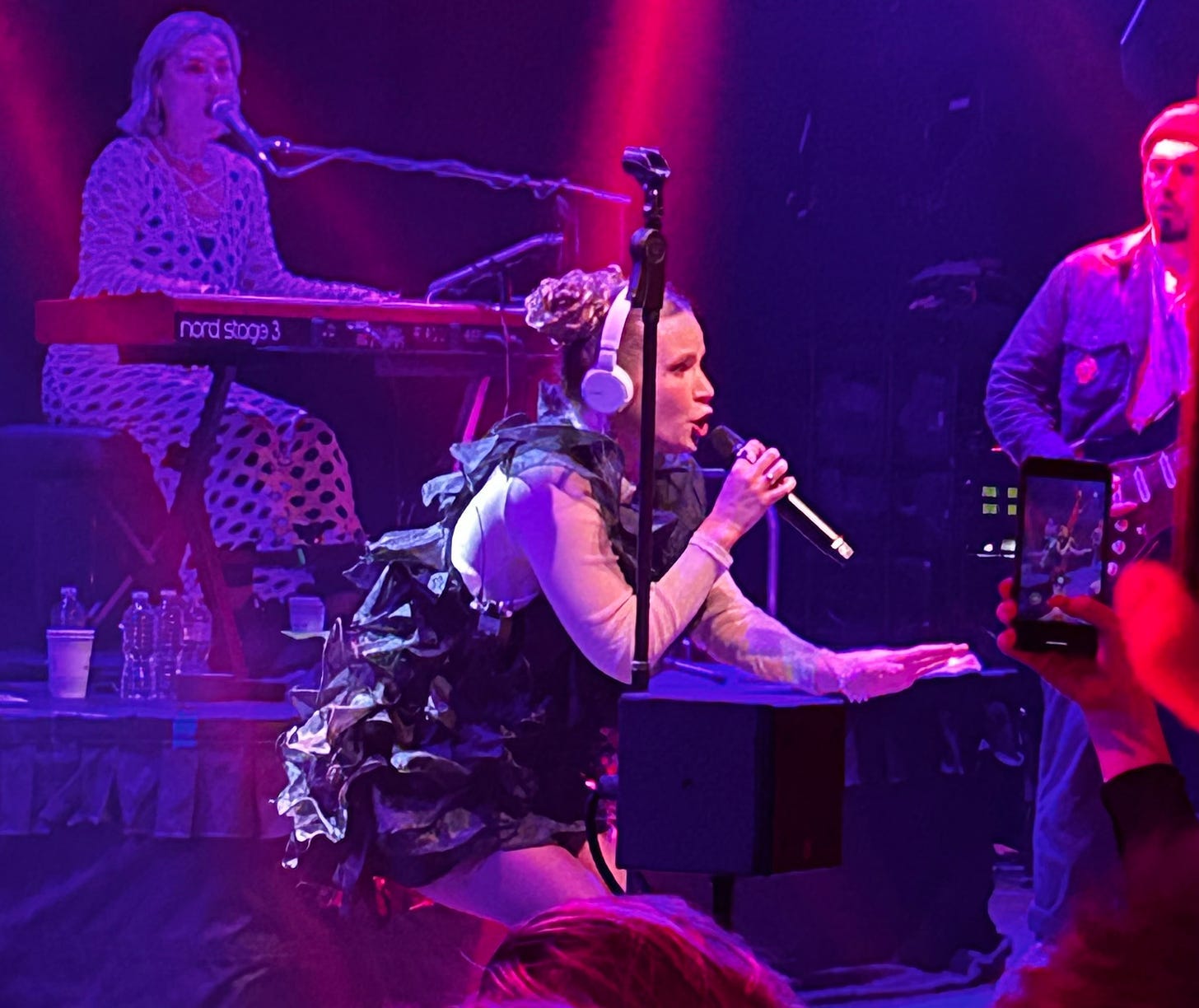 A group of people on stage

Description automatically generated
