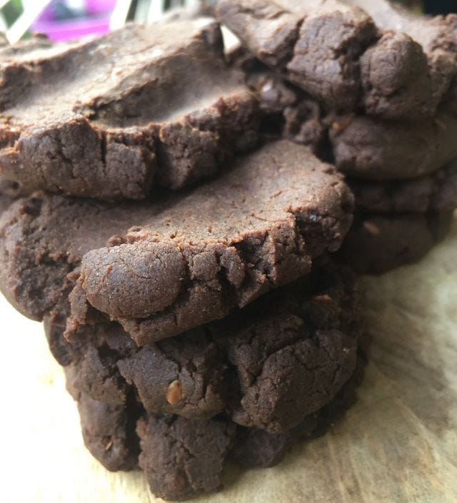A close up of a pile of chocolate ragi cookies A close up of a pile of chocolate ragi cookies
