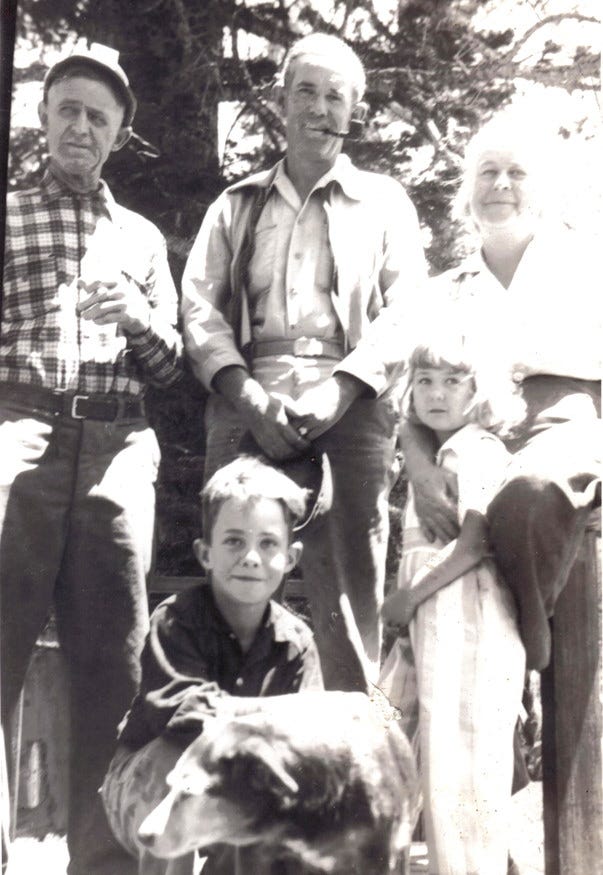  Thomas Tatton, left, with my father James as a young boy. Family on the right.
