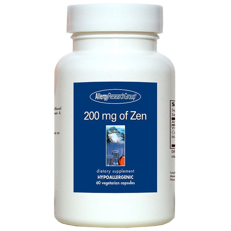 White bottle with blue label, text "200 mg of Zen" and "Hypoallergenic, 60 vegetarian capsules." Image of mountains and water.