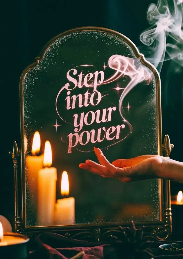 Step into your power image of a hand in a mirror with smoke rising and candles lit in a mirror