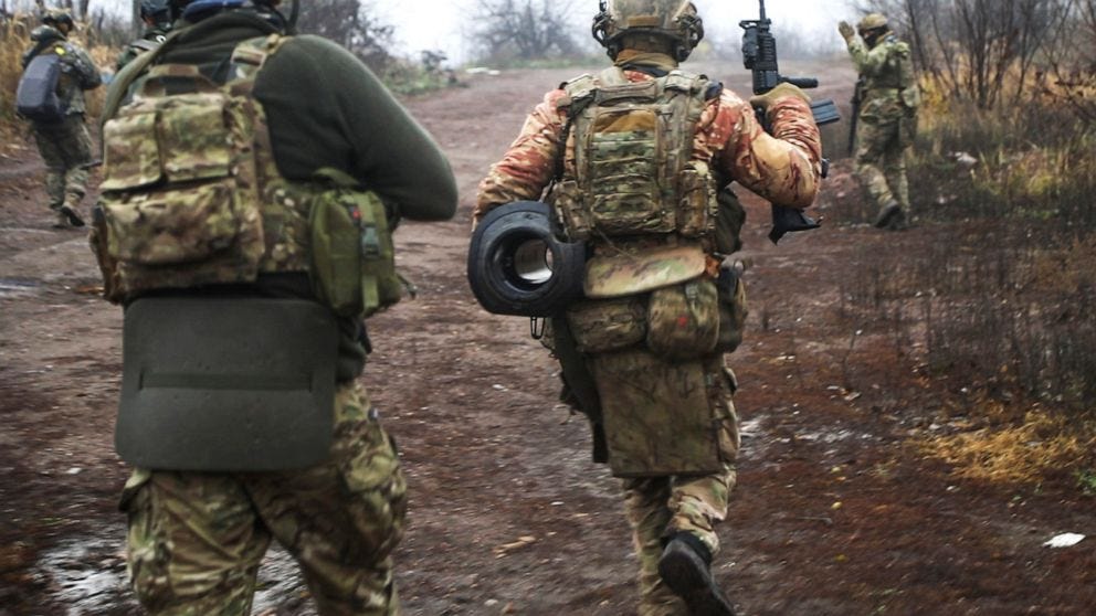 Ukrainian soldiers change their position at an undisclosed location in the Donetsk region, Ukraine, Thursday, Nov. 17, 2022. (AP Photo/Roman Chop) Ukrainian soldiers change their position at an undisclosed location in the Donetsk region, Ukraine, Thursday, Nov. 17, 2022. (AP Photo/Roman Chop)