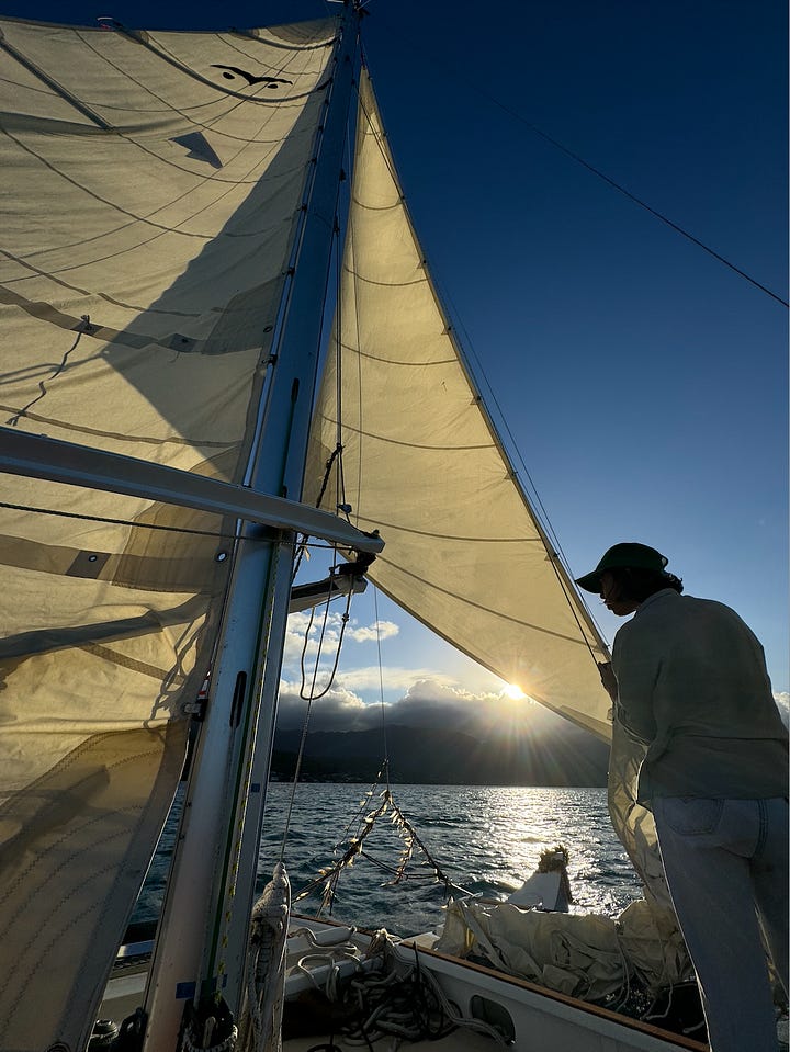 Sailing on double hulled outrigger canoe with my sister and my friend outside of kaneohe bay in east Oahu