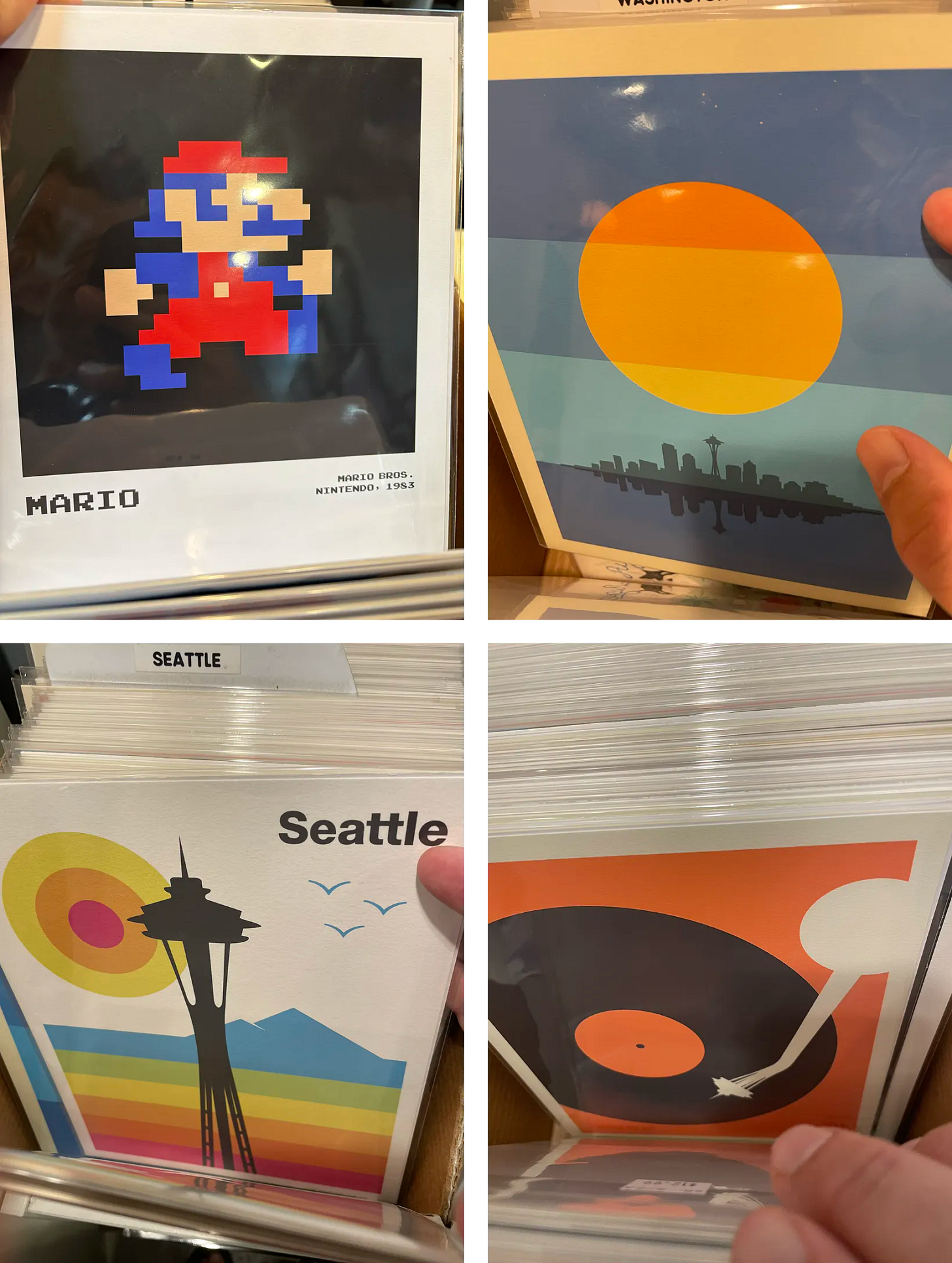 Four vintage posters, one of Mario, three of Seattle.