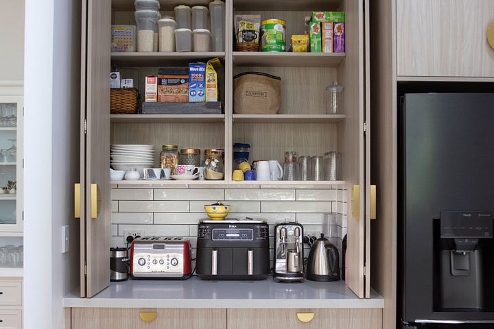Maximising space in a compact kitchen designed by Plush Design Interiors and Penelope Herbert