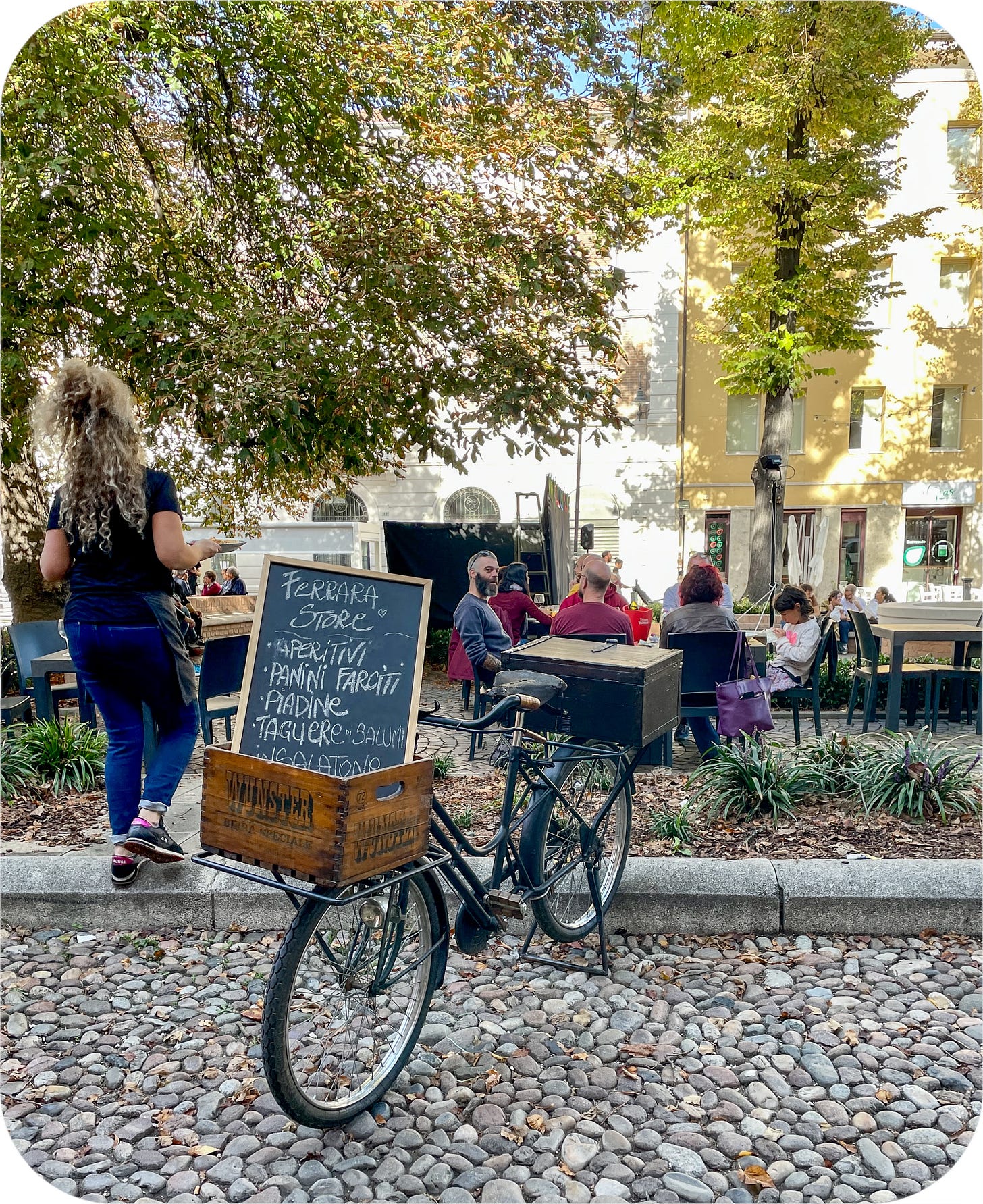 Bicycle in front of a cafe, Ferrara Italy