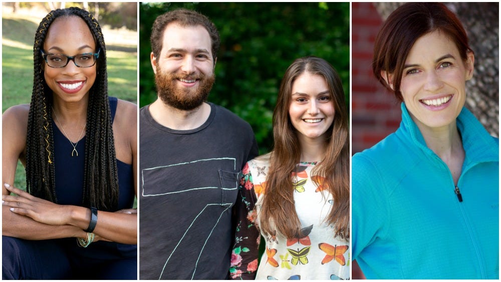 Image Description: Left: Smiling Black woman with long black hair and black glasses, wearing a black shirt; Center: Smiling white man with short brown hair and beard in a dark gray shirt, standing with smiling white woman with long brown hair in a long-sleeve butterfly patterned shirt; Right: Smiling white woman with short brown hair in a blue shirt. Image Description: Left: Smiling Black woman with long black hair and black glasses, wearing a black shirt; Center: Smiling white man with short brown hair and beard in a dark gray shirt, standing with smiling white woman with long brown hair in a long-sleeve butterfly patterned shirt; Right: Smiling white woman with short brown hair in a blue shirt.