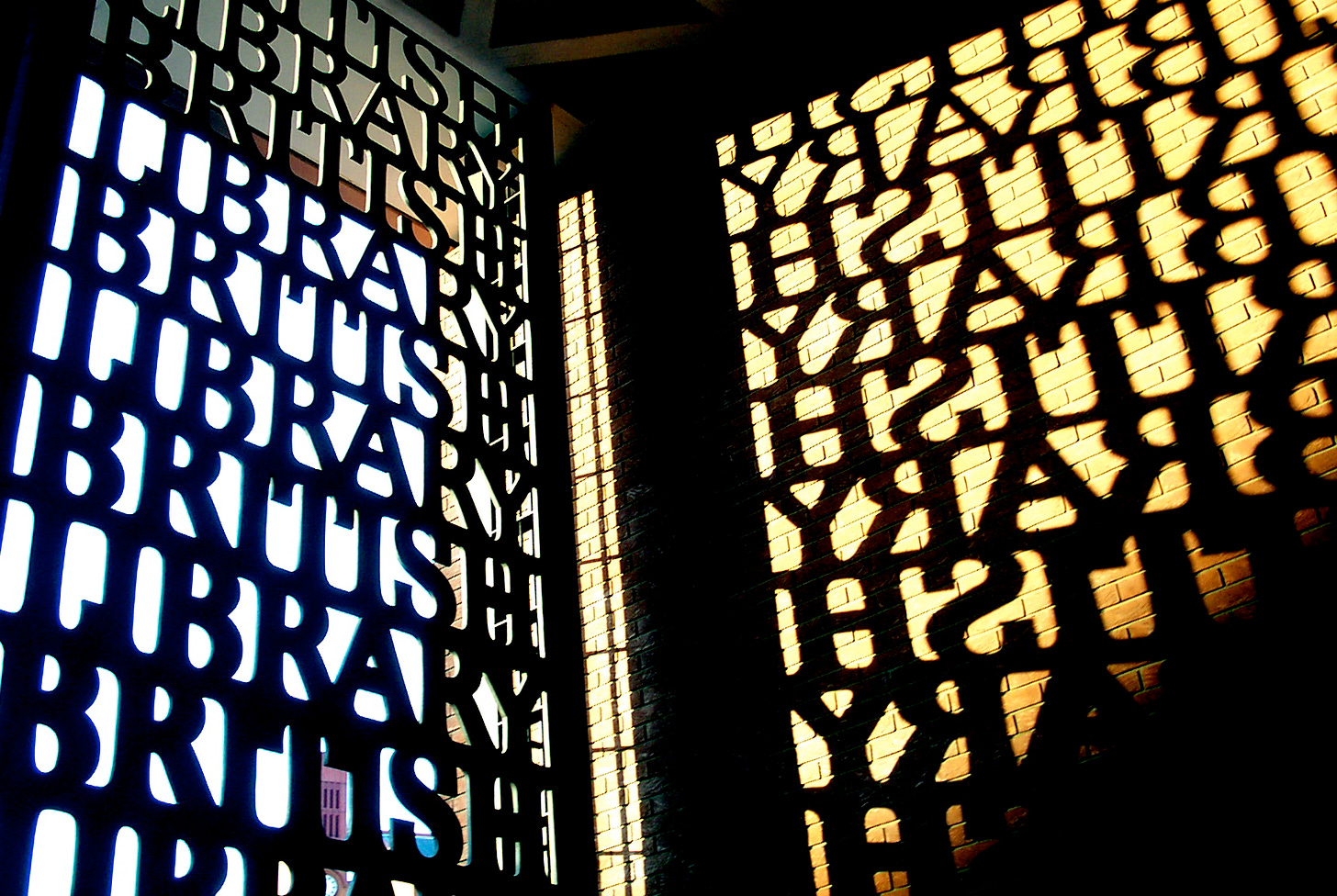 The entrance gate to the British Library and its shadow (designed by David Kindersley and Lida Lopes Cardozo Kindersley)