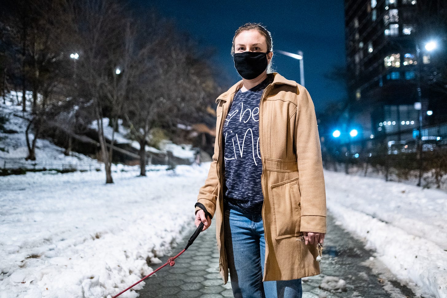 Me, standing in a park in Harlem, NY, wearing a shirt that says “be kind.”