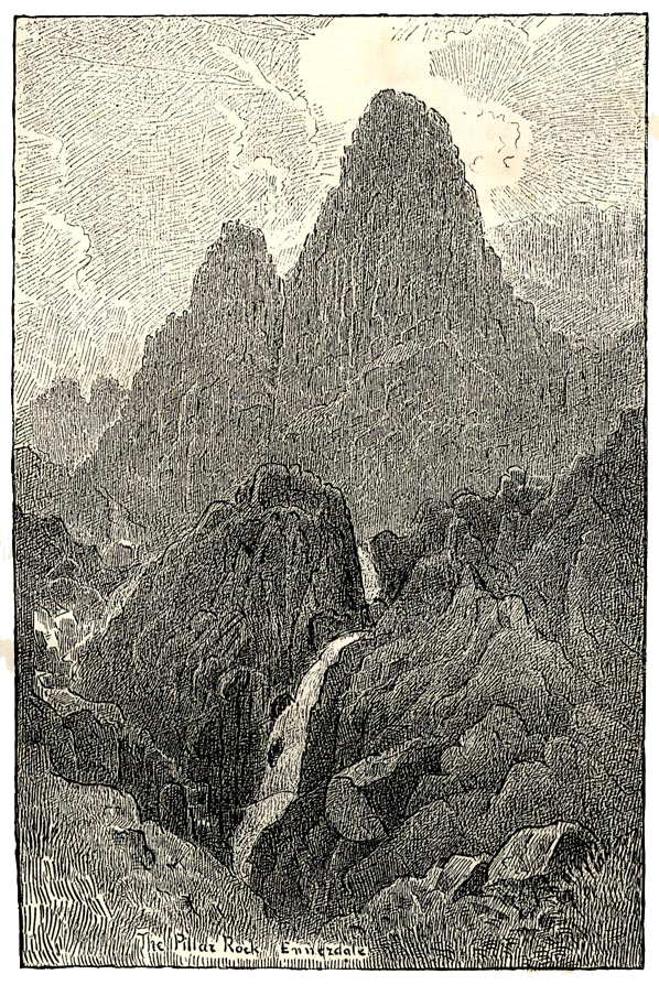 two rock towers,waterfall below