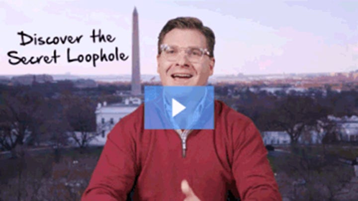 A person in a red sweater
Description automatically generated