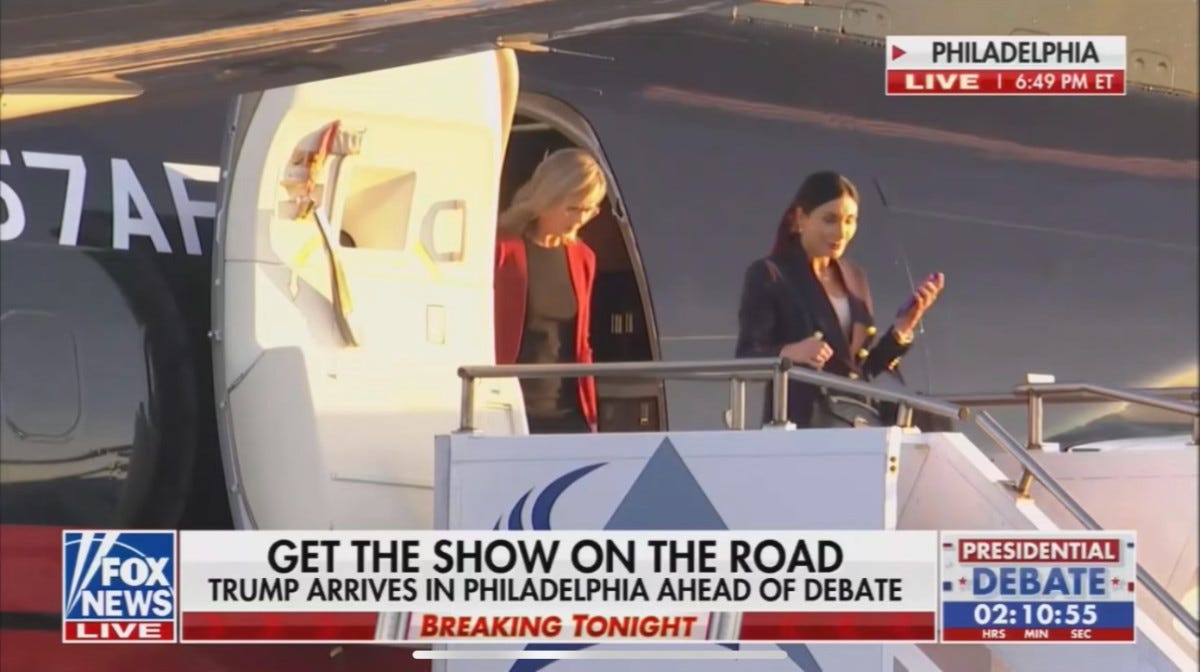 Laura Loomer exiting Trump's jet ahead of the ABC News