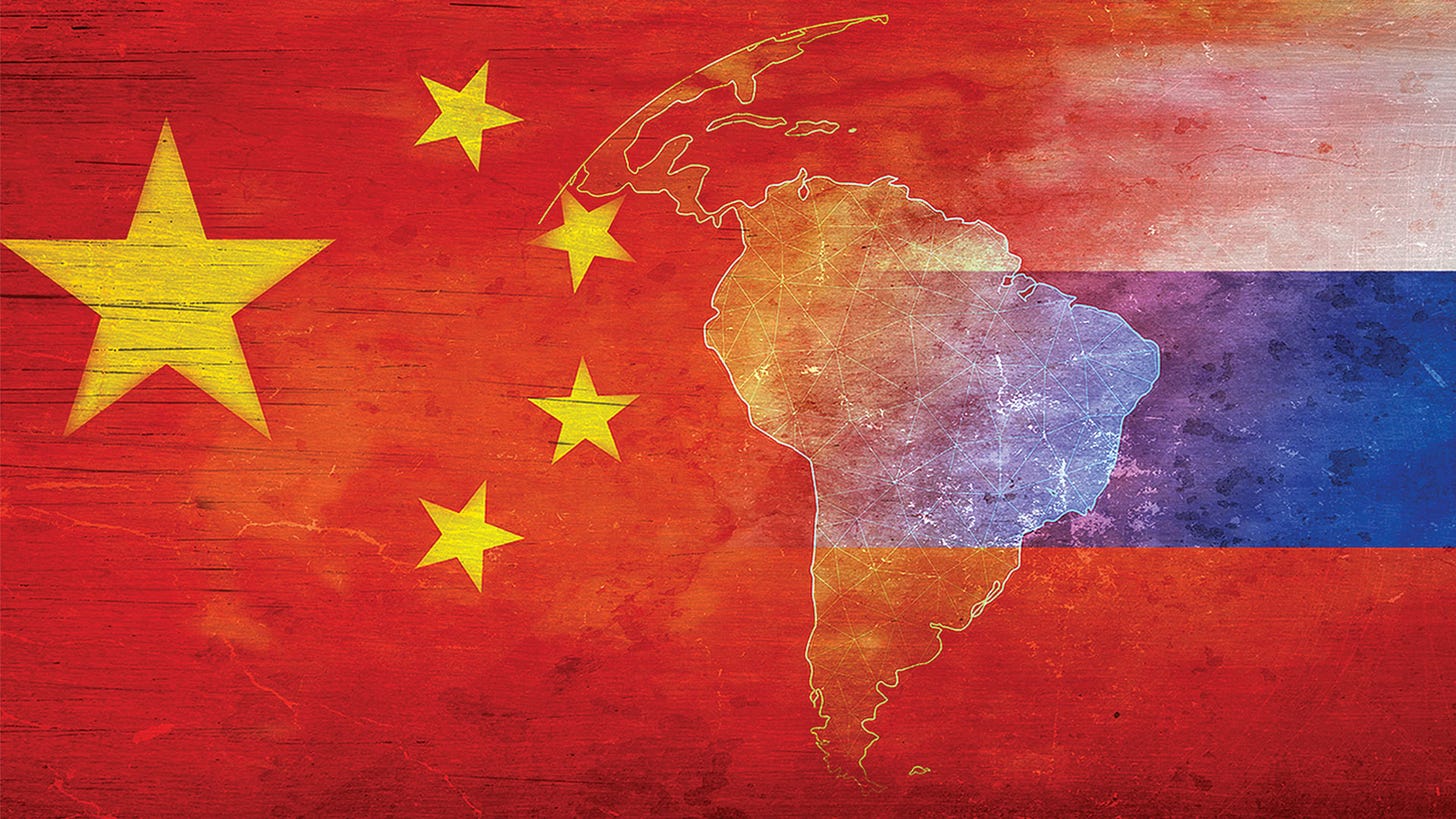 Outline of South America overlaid on the flags of China and the United States.