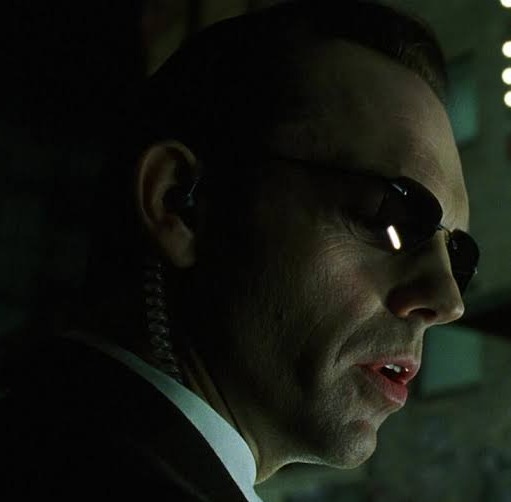 Agent Smith (Hugo Weaving) from The Matrix.