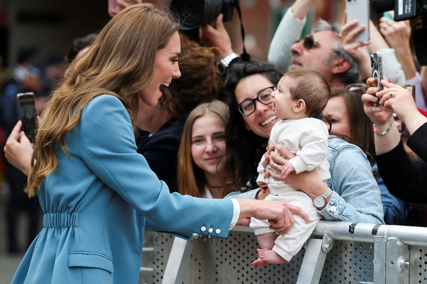 Princess Catherine chatting to a baby Princess Catherine chatting to a baby