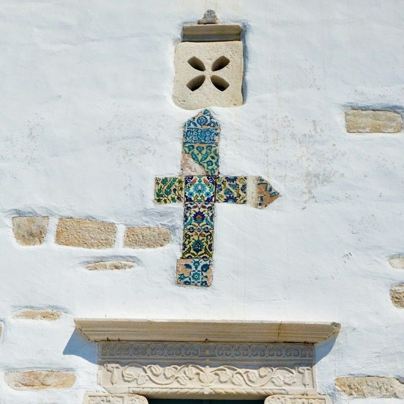 a woman standing in a doorway of a church