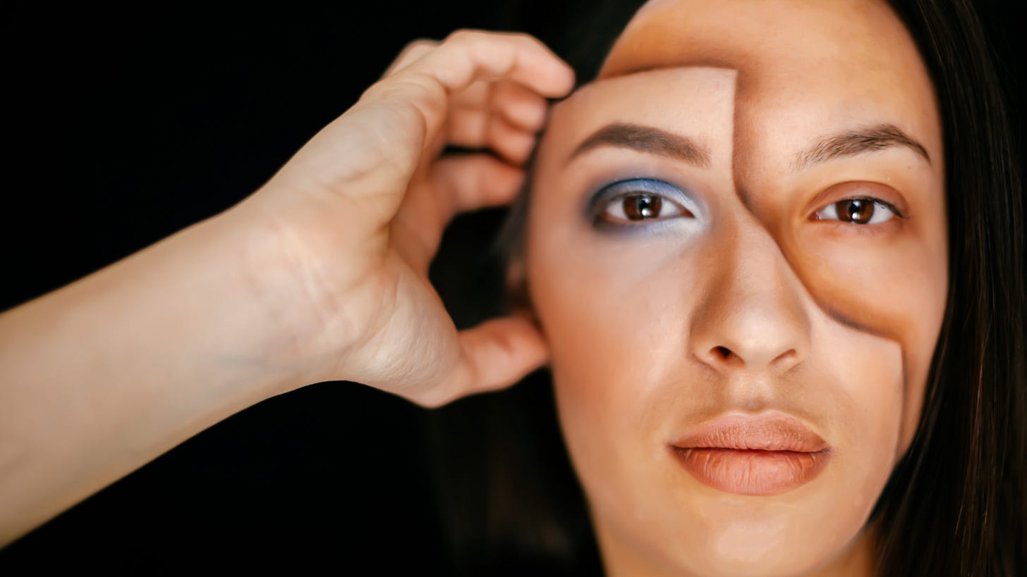 Photo illustration of a woman appearing to remove a mask of her face Photo illustration of a woman appearing to remove a mask of her face