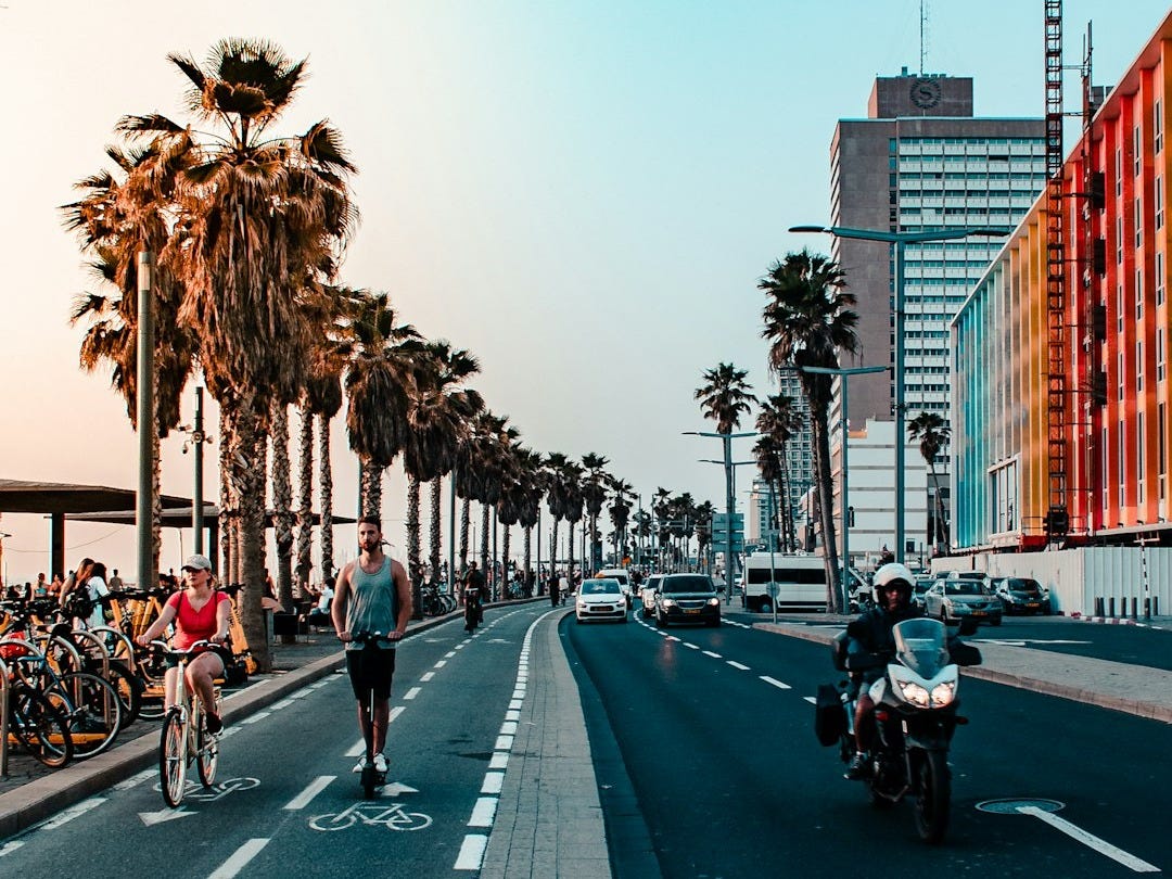 people riding motorcycle on road during daytime people riding motorcycle on road during daytime