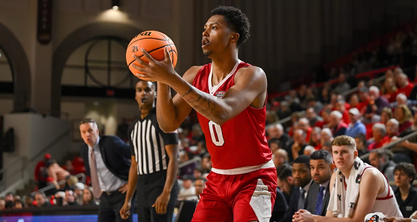 Eian Elmer of Miami (OH) shooting a three-pointer during a basketball game.