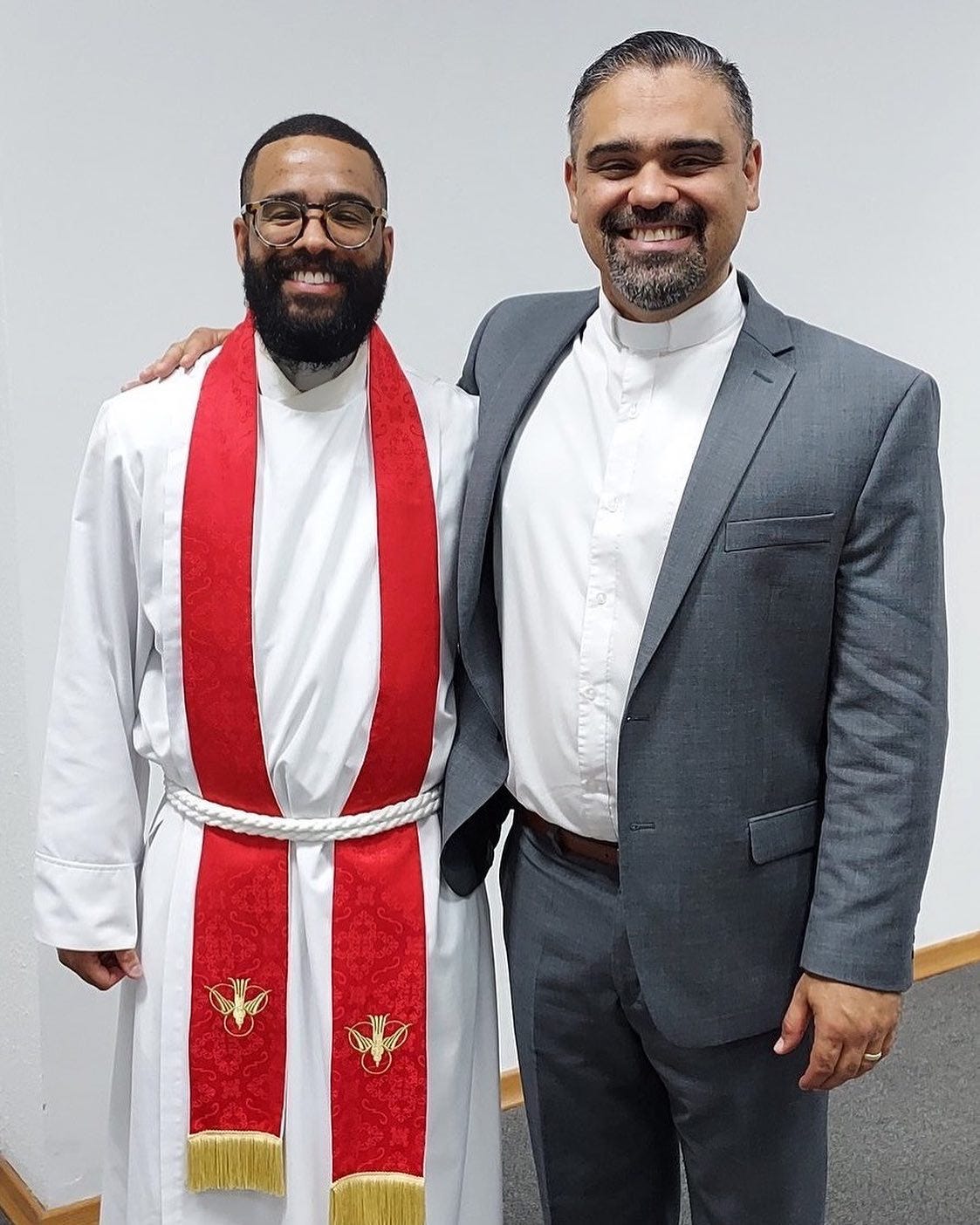 May be an image of 2 people, beard, people standing and indoor